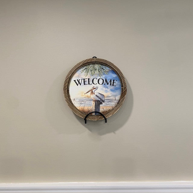 Pelican "Welcome" Round Wood Framed Artwork